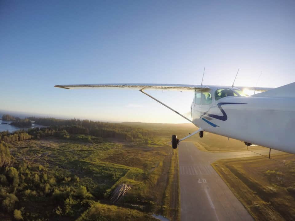 aerial shot from outside of plane looking forward